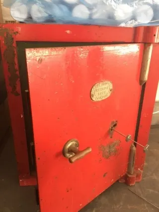 Antique red Milners of London safe standing open after non-destructive opening